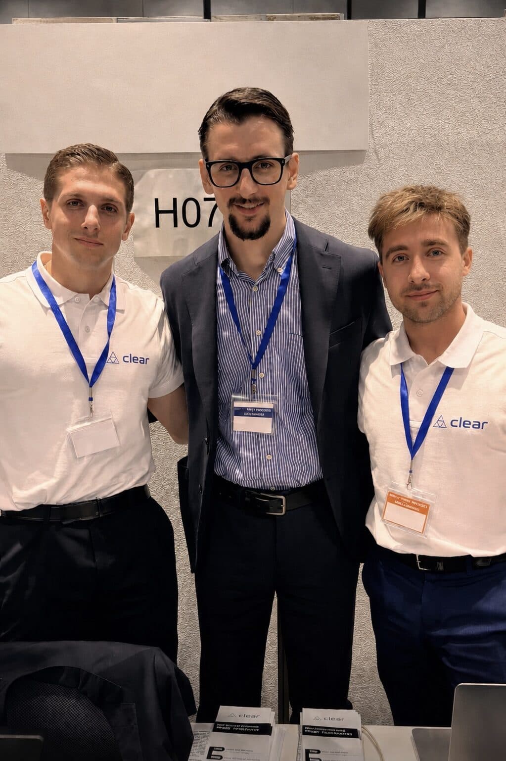Clear team at industry event: Fabrizio Longato (left), Riccardo Longato (center), and Enrico (right)